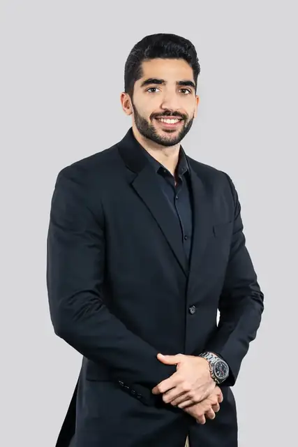Corporate headshot on a light studio background
